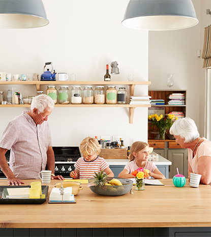 Grandparents at Kitchen Island with Their Grandkids Are Fixed Index Annuities a Good Investment Michigan