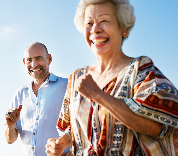 Smiling Senior Couple Running Guaranteed Basic Income Michigan